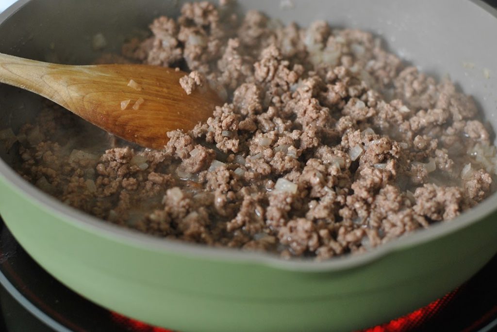 Ground Beef being fried in a pan