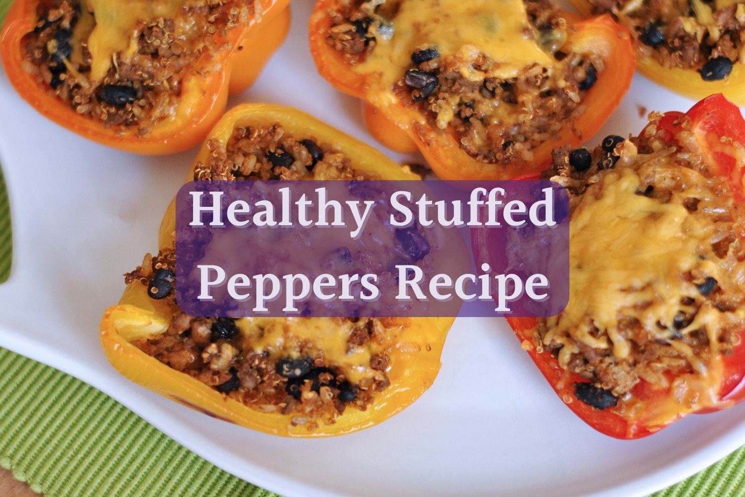 Healthy Stuffed Peppers Recipe: A mixture of red, orange and yellow peppers stuffed with meat, cheese, rice, beans and couscous