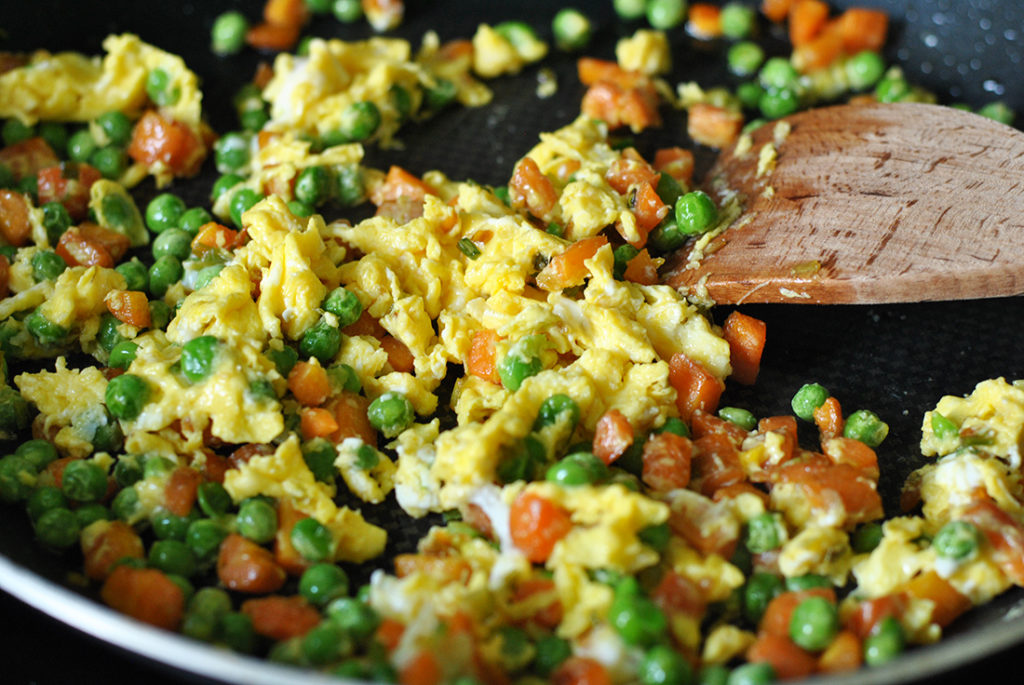 Frying Egg and Vegetables