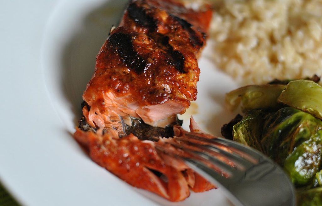 Cooked Grilled Salmon: The salmon parts easily and is light pink inside