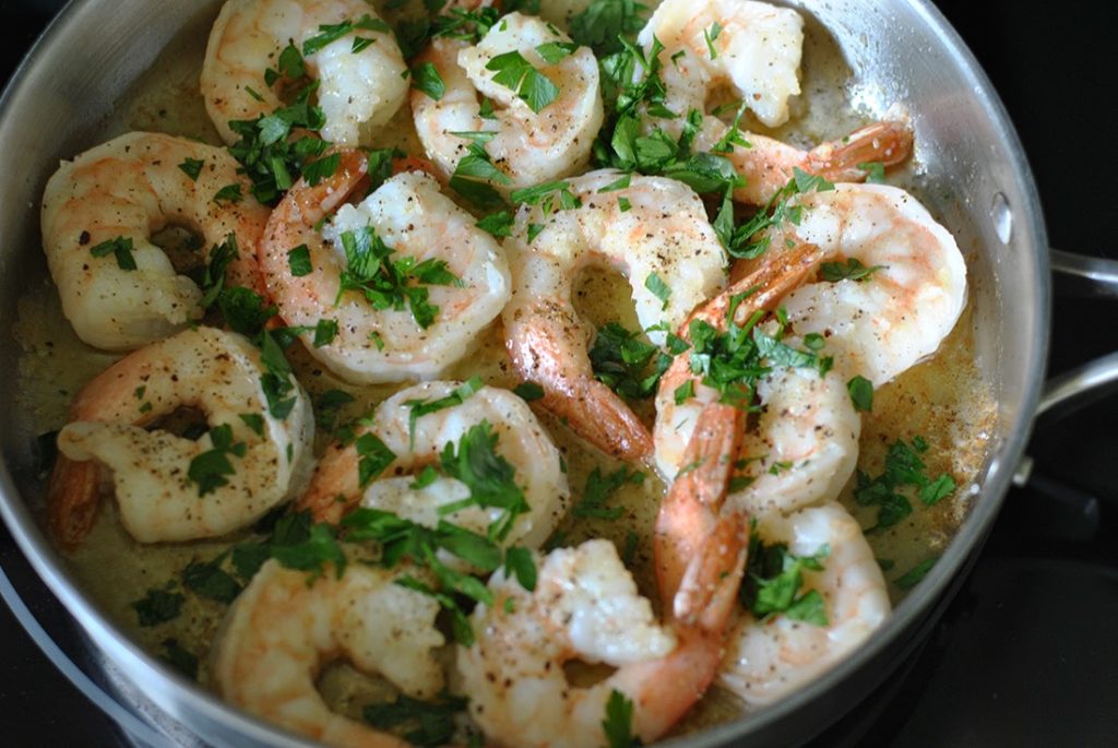 Sautéed shrimp with lemon and parsley added