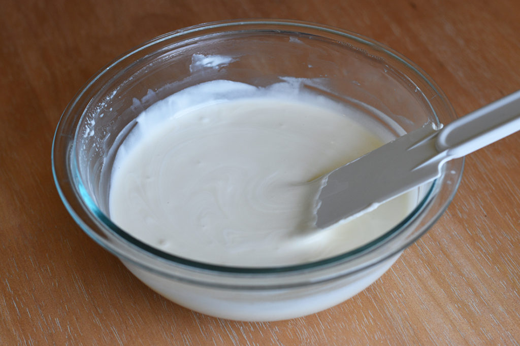 Folding whipped cream into homemade ice cream