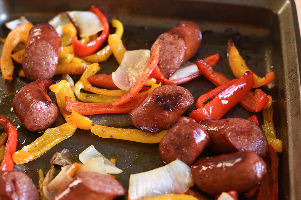 Baking the sausage and peppers in the oven