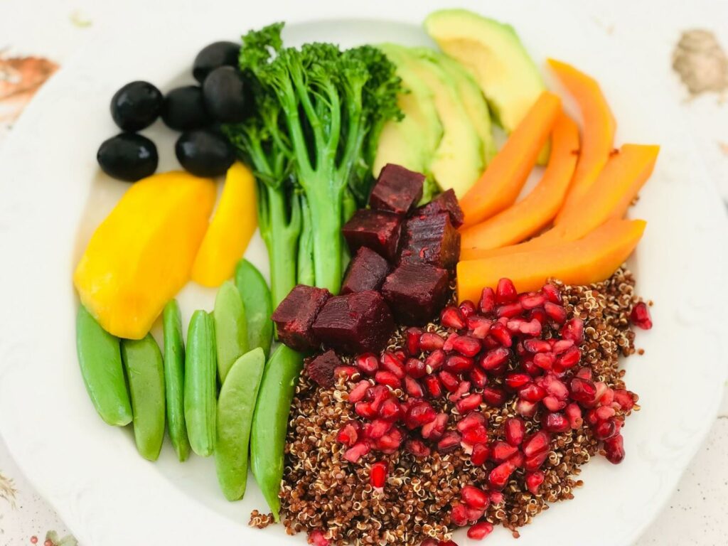 Sliced vegetables with cooked quinoa